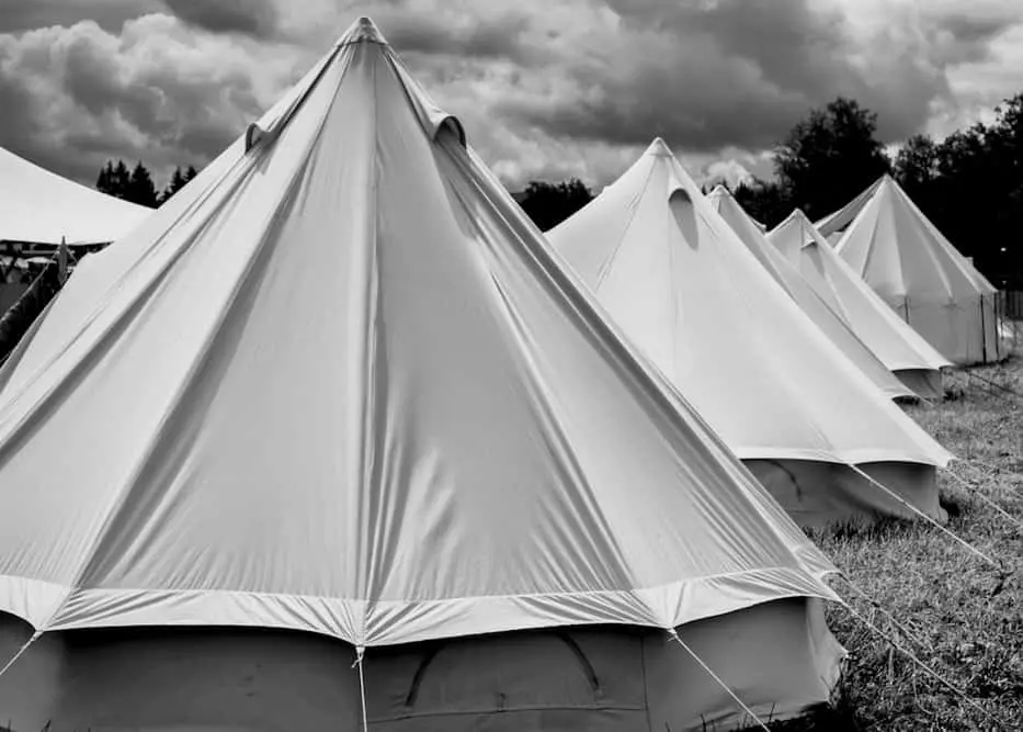 Black and white photo of camping tents.